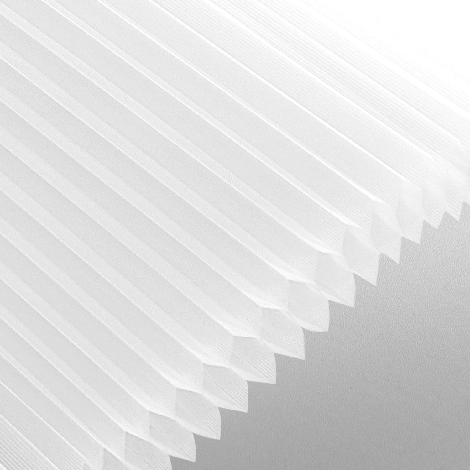Close-up of light filtering cellular fabric