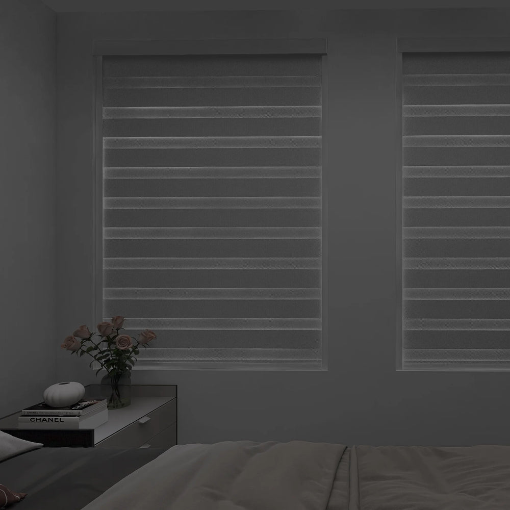 Motorized zebra shades in privacy mode fully closed for enhanced bedroom privacy and darkness