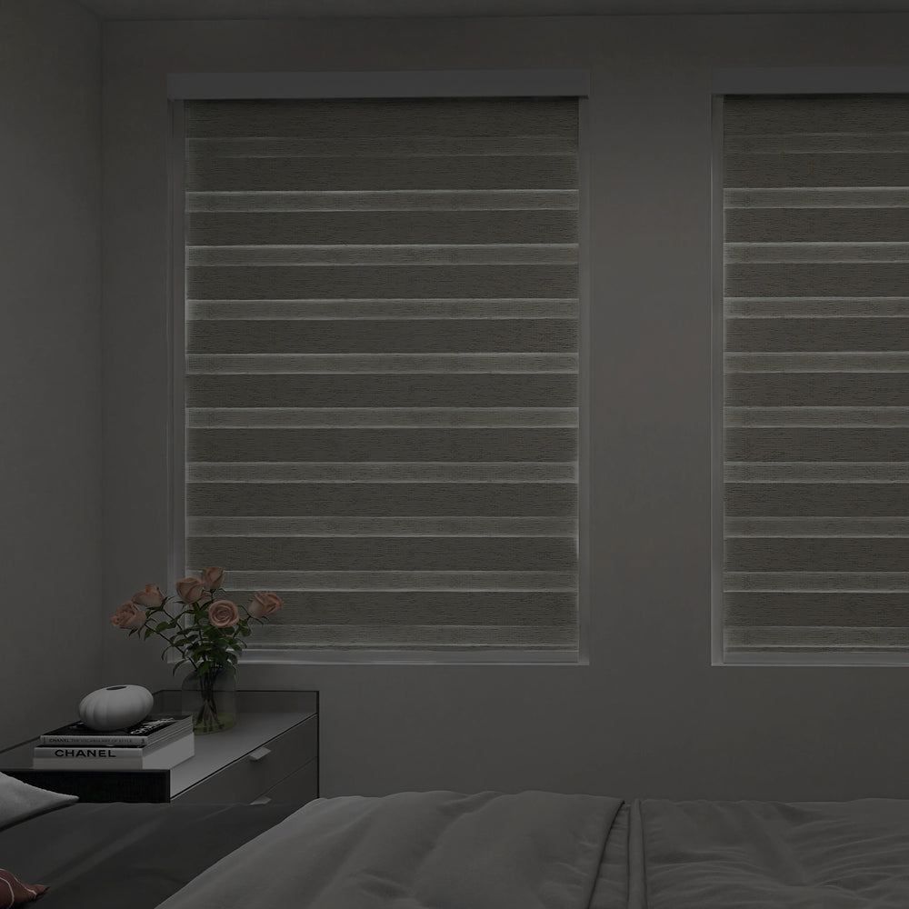 Motorized zebra shades in privacy mode mostly closed for enhanced bedroom privacy and reduced light