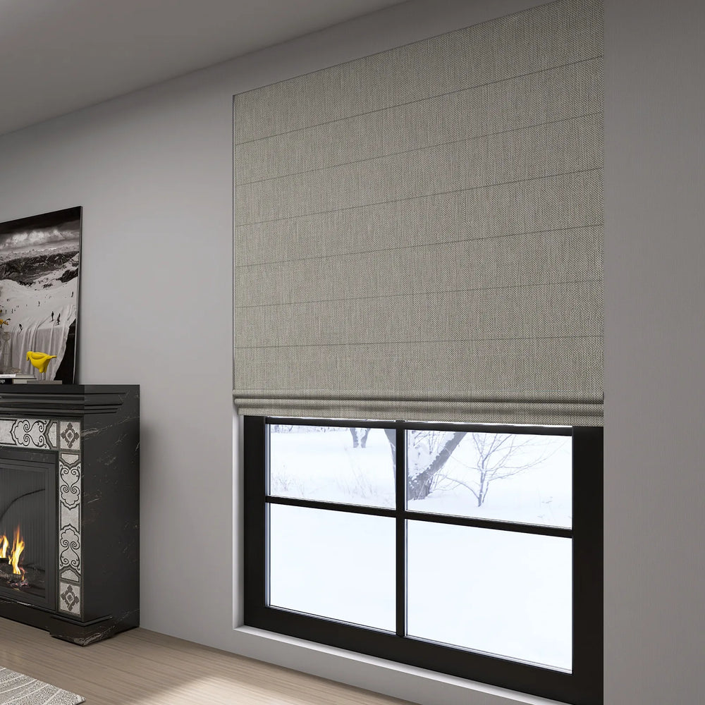 Roman shades in light-filtering mode in a cozy bedroom
