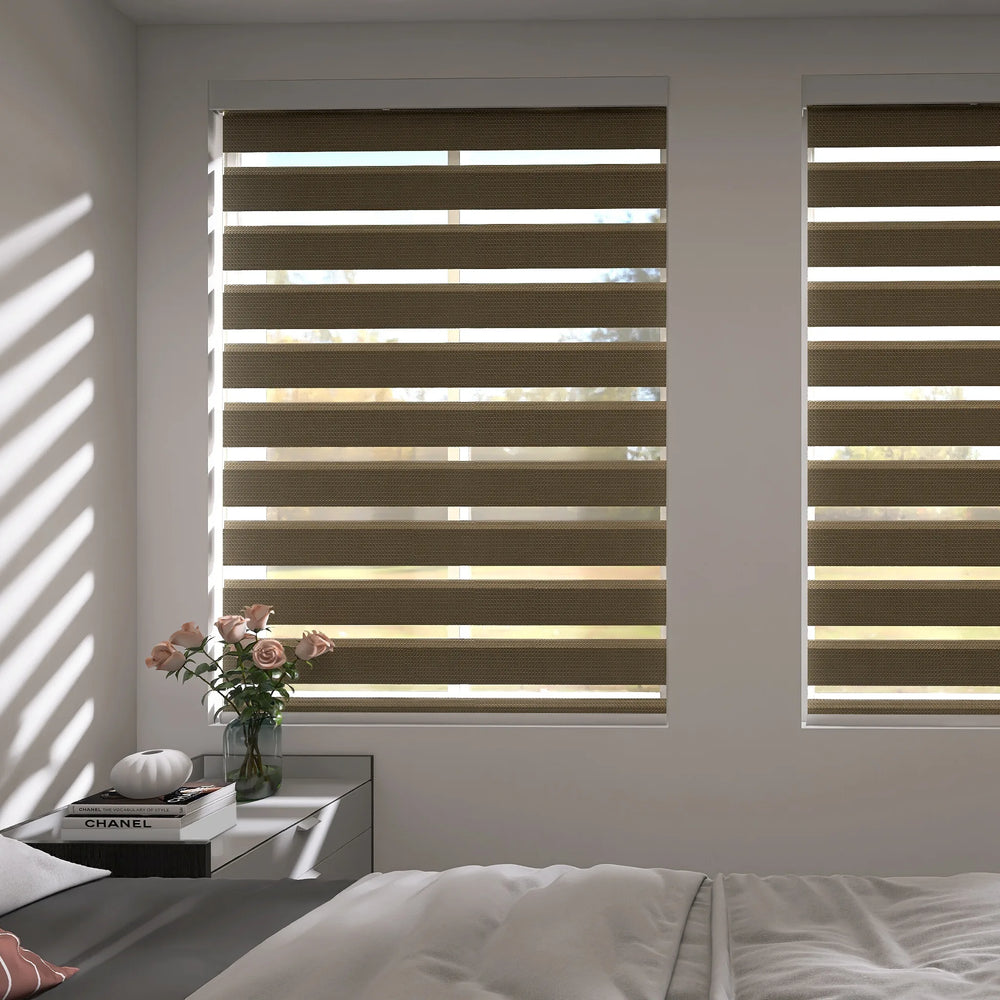 Motorized Zebra Shades in light-filtering mode in a cozy bedroom