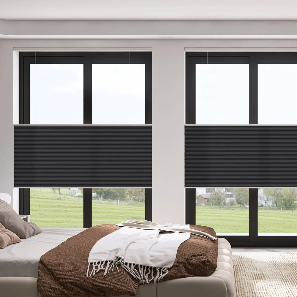 ZSTARR cellular shades partially open in a cozy bedroom
